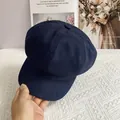Detailed view of the dark blue cotton linen newsboy cap with textured fabric finish - L / Navy Blue
