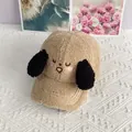 Detail of embroidered puppy face and plush ears on a cozy lamb wool baseball cap - Adjustable / Khaki