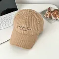 Detailed close-up of khaki plush baseball cap with Grow Positive Thoughts embroidery - Adjustable / Khaki