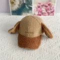 Close-up of fuzzy sherpa baseball cap featuring long ears and Sparkle embroidery - Adult / Khaki & Caramel