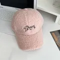Close-up detail of Balance embroidery on pink lamb wool winter baseball cap - Adjustable / Pink