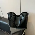 Minimalist black glossy leather tote bag with long straps for women's business use - Black