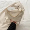 Minimalist beige crossbody tote bag with a golden chain strap and matte texture finish - No Pendant / White
