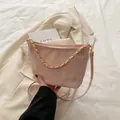 Light pink tote bag with crinkled texture, gold chain handle, and adjustable shoulder strap - No Pendant / Pink