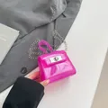 Mini bolso jelly rosa con cierre de giro plateado y correa de cadena metálica - Rosa Rojo