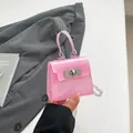 Mini bolso de gelatina rosa translúcido con cierre de metal y cadena plata - Rosa