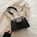 Classic black PU leather shoulder bag with sparkling rhinestone buckle and silver chain - Black