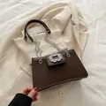 Dark brown rectangular shoulder bag with large rhinestone buckle and chain strap - Brown