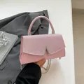 Borsa a mano rosa glitterata con fibbia geometrica argento e tracolla a catena - Rosa