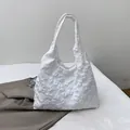 White floral jacquard tote bag with textured relief fabric and comfortable wide handles - White