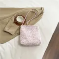 Pink shoulder bag with white lace floral pattern in a stylish square bucket design - Pink