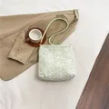 Chic light green shoulder bag with white floral lace overlay and gold hardware - Green
