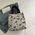 Chic butterfly pattern jacquard tote bag with black handles on casual denim background - Colorful Butterfly Pattern (Style 2)