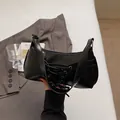Sac bandoulière rétro en simili cuir noir avec nœuds chic et poches latérales - Noir