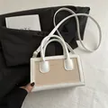 Elegant beige canvas and white leather shoulder bag for women with gold lettering finish - White