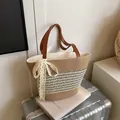 Woven straw bucket bag with black and white stripes and a white lace bow detail - Natural Woven With Scarf (Style 3)