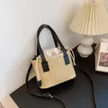 Straw woven tote bag with black leather trim and drawstring insert for summer vacation - Black