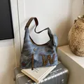 Bolso tote retro de mezclilla gris humo con detalles en cuero marrón y pequeño monedero - Azul