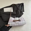 Pink and white checkered baguette bag with brown faux leather bow and slim shoulder strap - Purple