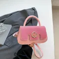 Pink leather crossbody bag with fabric patchwork and golden M-logo clasp detail - Pink
