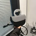 Minimalist black leather saddle bag with grey woven lid and fluid silver metal handle - Black