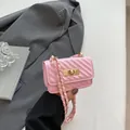 Pink quilted mini square crossbody bag with gold hardware and chain strap details - Red