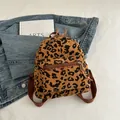 Mini corduroy backpack featuring a leopard print design with durable canvas straps - Brown