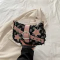 Bolso de tweed a cuadros con estrellas de cuero rosa y cadena metálica plateada - Cuadros Negro