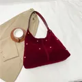 Deep red velvet crescent hobo bag with gold metal studs and leather shoulder strap - Red