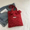 Rode bloemen tote bag met ruches en AGOGO-label voor lente vakantiestijl - Rood