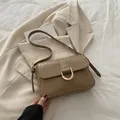 Bruine crossbodytas met krokodillenpatroon, gouden hoefijzergesp en smalle riem - Khaki