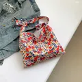 Floral print cloth shoulder bag with bow strap and vibrant botanical pattern design - Red