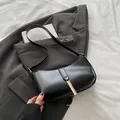 Minimalist black PU leather crescent underarm bag with gold metal buckle decoration - Black