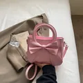 Bolso bandolera rosa con lazo grande y asa superior para moda femenina - Rosa