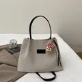 Beige canvas tote bag with black leather handles and cute plush charm pendant - Beige And Black (With Pendant)