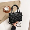 Elegant black quilted PU leather crossbody bag with top handles and gold hardware - Black