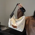 Creamy white canvas hobo bag with colorful letter embroidery and black shoulder strap - Khaki