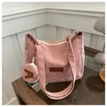 Pink corduroy tote bag with fashion leather patch and a small round coin purse charm - Pink
