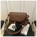Deep brown leather underarm bag with Fashion & Bags print and stylish knotted strap - Coffee