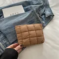 Brown quilted puffer makeup bag with soft padded texture for versatile daily storage - Khaki