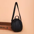Spherical black lychee pattern PU leather crossbody bag with adjustable strap and handle - Black