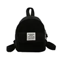 Mini zaino in velluto a coste nero con tasca frontale ed etichetta con logo bianco - Nero