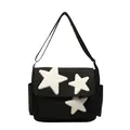 Borsa a tracolla nera con stelle di peluche bianche e tracolla regolabile - Nero