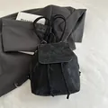 Sac à dos vintage noir pour femme avec texture plissée et fermeture à cordon - Noir