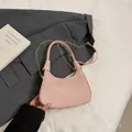 Pink patent leather baguette bag with textured finish and golden chain strap - Pink