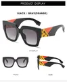 Détail des lunettes de soleil carrées noires avec verres dégradés et branches en écaille orange - Monture Noire Verre Dégradé Gris (Orange)