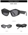 Detaillierte Vorder- und Seitenansicht der schwarzen geometrischen Cat-Eye-Sonnenbrille - Schwarzer Rahmen Schwarz Graue Gläser