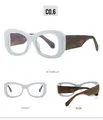Drie hoeken van ovale blauwlichtfilterbril met wit montuur en schildpadkleurige pootjes - Wit Frame