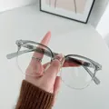 Occhiali quadrati grigio trasparente con lenti anti-luce blu e montura oversize alla moda - Sfumato da Grigio a Trasparente