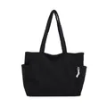 Large black corduroy tote bag for women featuring vertical texture and dual side pockets - Bag / Black